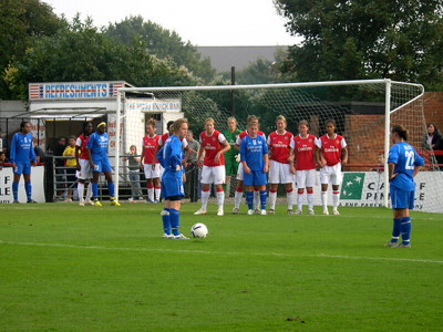 Player lying behind a wall