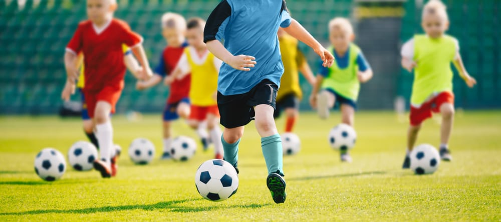 Kids playing with a soccer ball