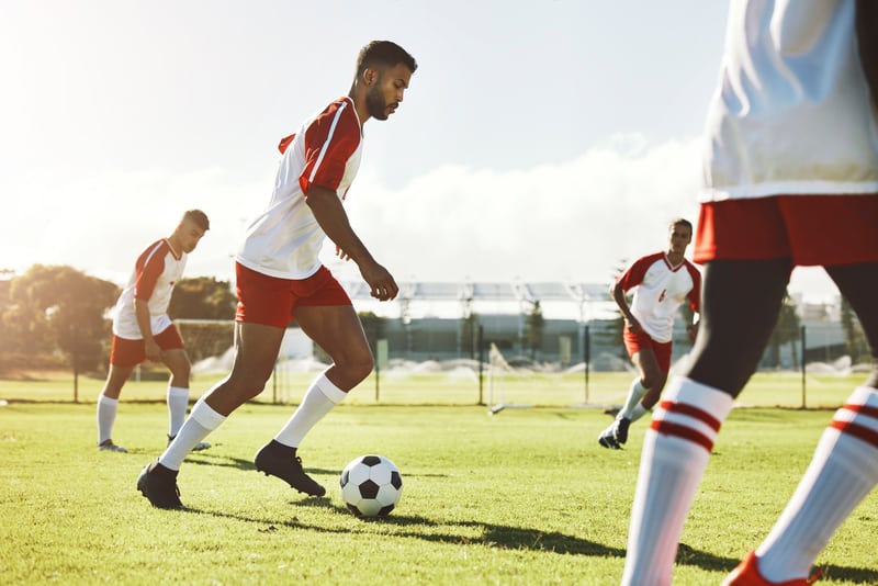 Soccer players running in training