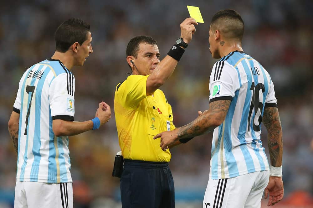 yellow card explain by soccer referee