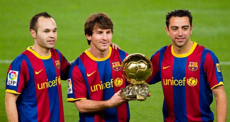 Lionel Messi holding the Ballon d'Or